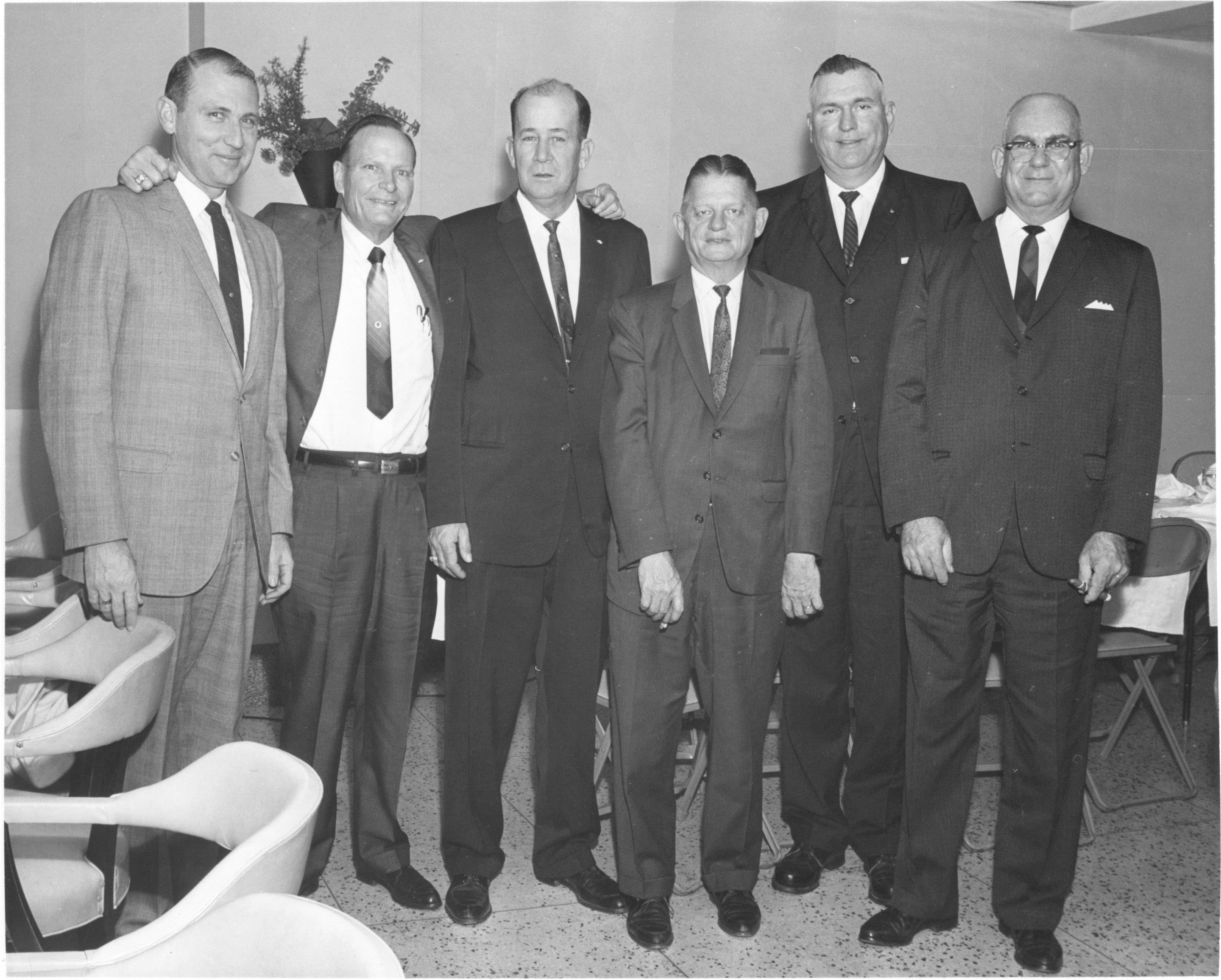 Group of men in suits and ties