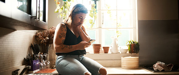 Worried woman reading on phone, searching social media or receiving bad news on technology 