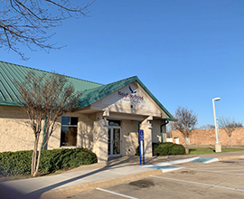 Outside of building with logo sign