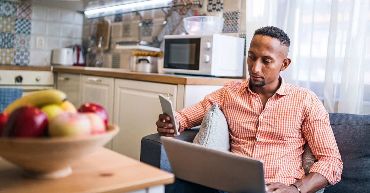 Young man working in his home office