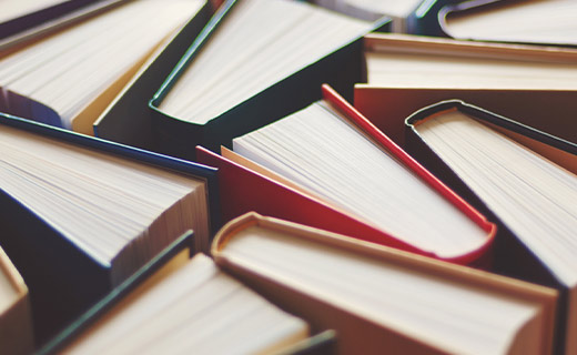 books standing up next to each other fanned out