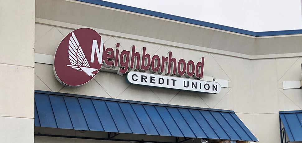 Building with logo sign