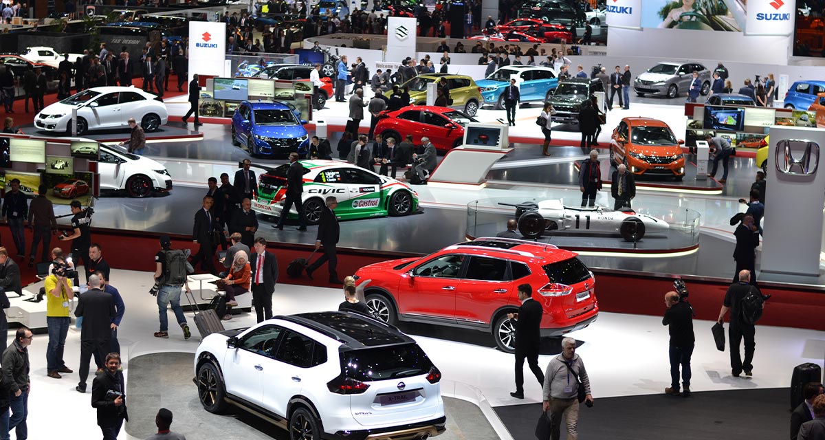 Overhead shot of a car show gallery.