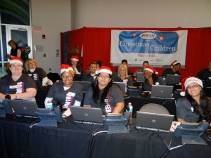 People sitting in front of phones and computers