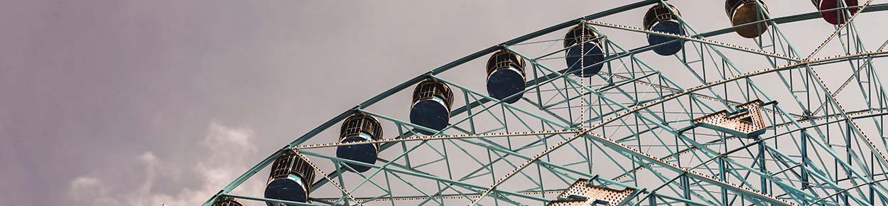 Ferris wheel against blue sky