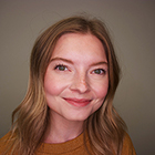 Headshot of female smiling into the camera