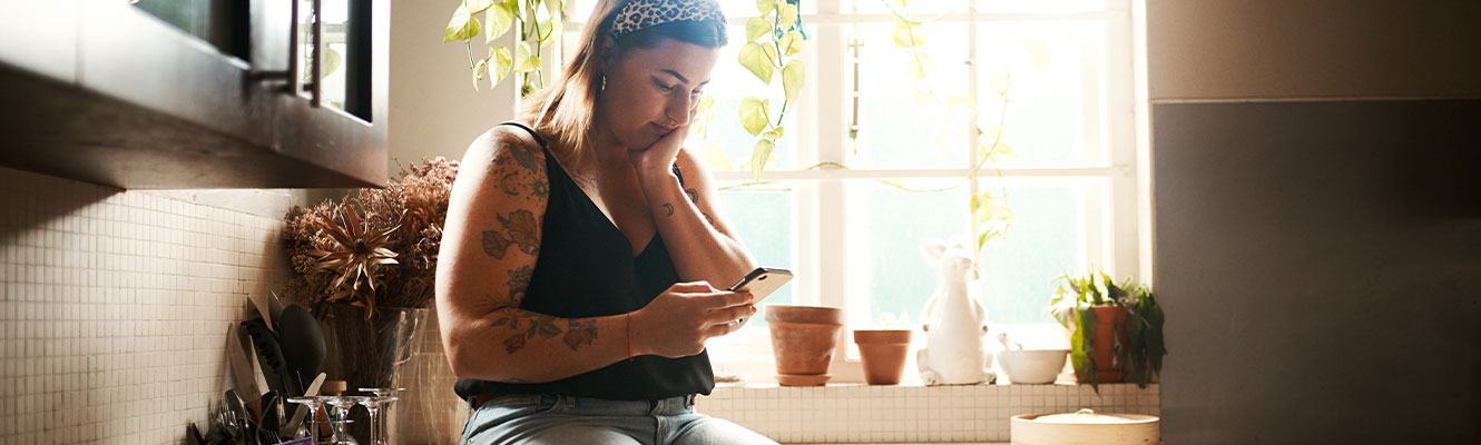 Worried woman reading on phone, searching social media or receiving bad news on technology