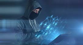 an edited image of a man with a hood on and ski mask covering his face looking at a tech device.