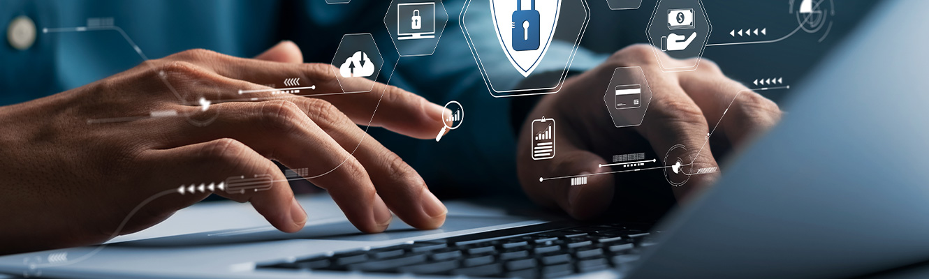 Still image of a person typing on laptop with various lock icons appearing
